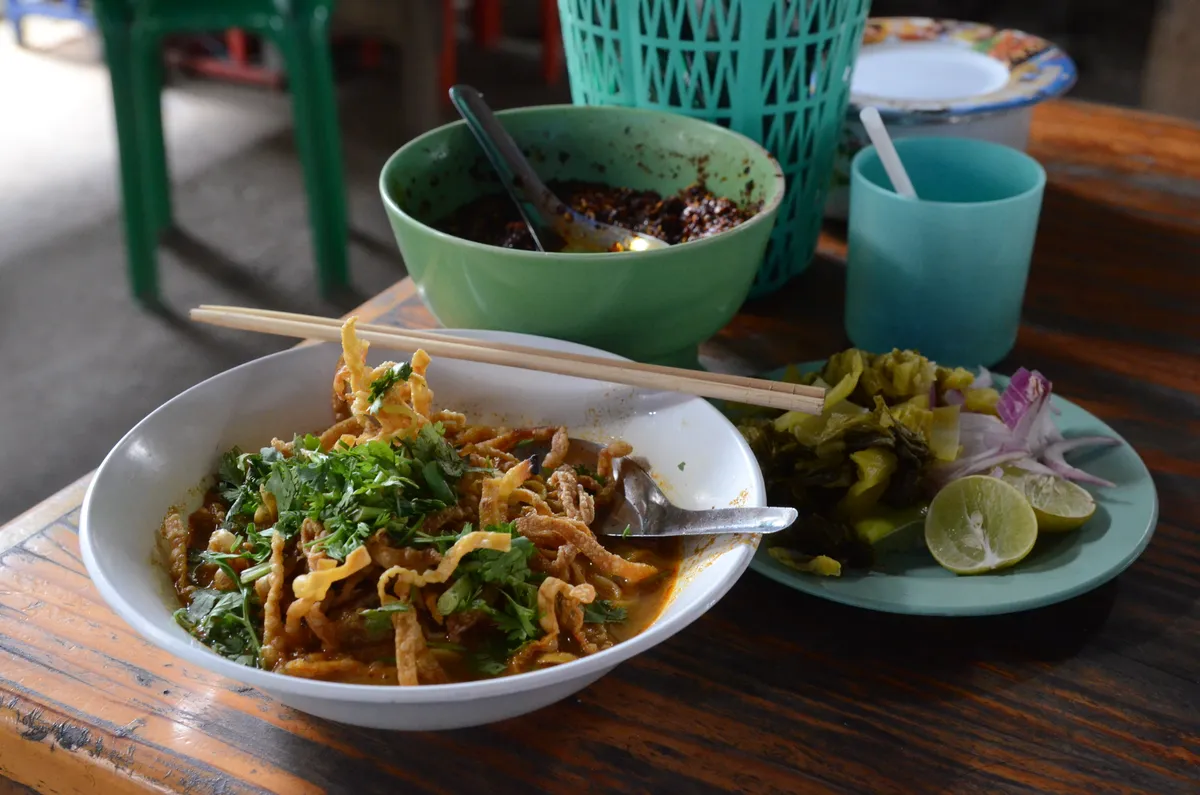 10 ร้านอาหารเหนือและข้าวซอยเชียงใหม่ระดับมิชลิน บิบ กูร์มองด์ 2569 ที่คนท้องถิ่นกินจริง
